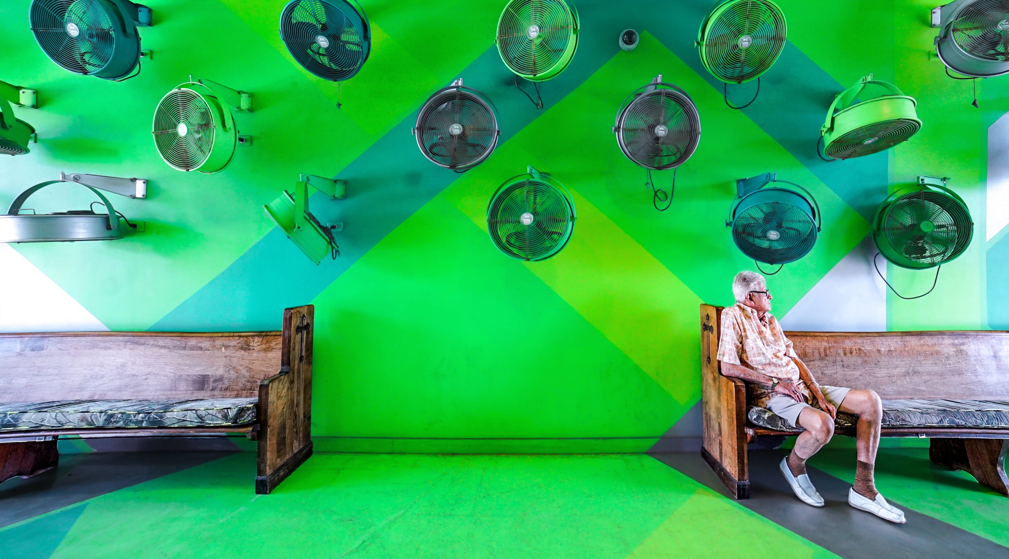 Industrial wall-mounted fans for pressurization systems